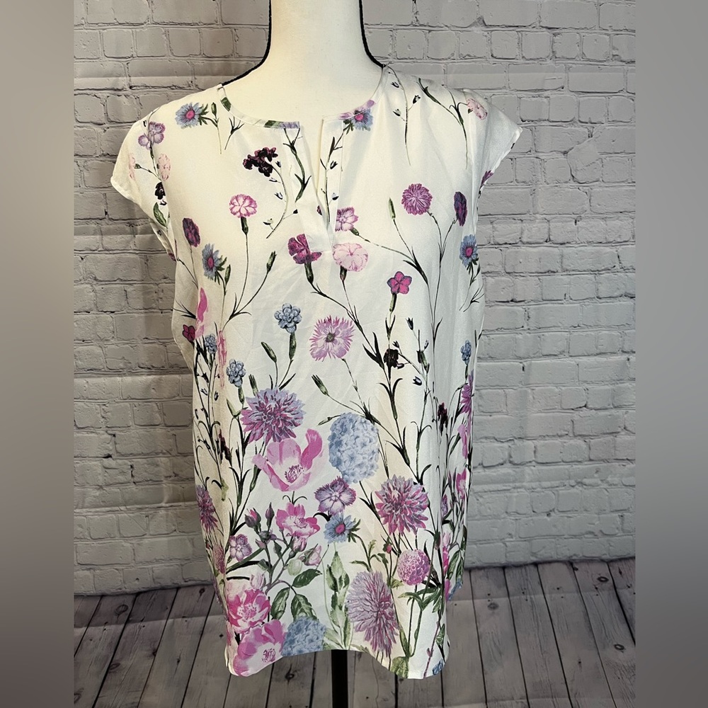 Light blouse with floral decor